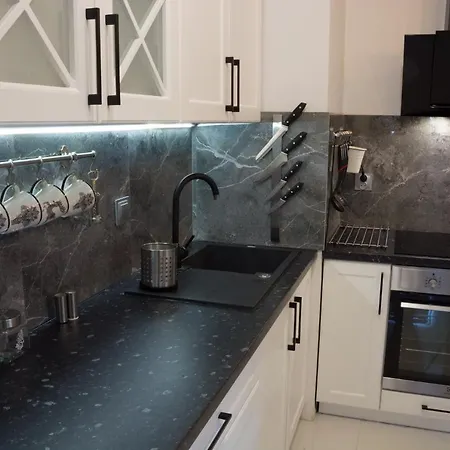 Apartament Lodz4rent - Klimatyzacja - Premium 9,7 - Manufaktura - Garaż - Audioriver 2026