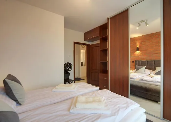 شقة Lodz4rent - Premium 9,7 - Manufaktura - Garaz - Ziemia Obiecana 2026 *