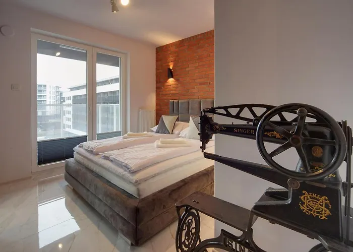 شقة Lodz4rent - Premium 9,7 - Manufaktura - Garaz - Ziemia Obiecana 2026