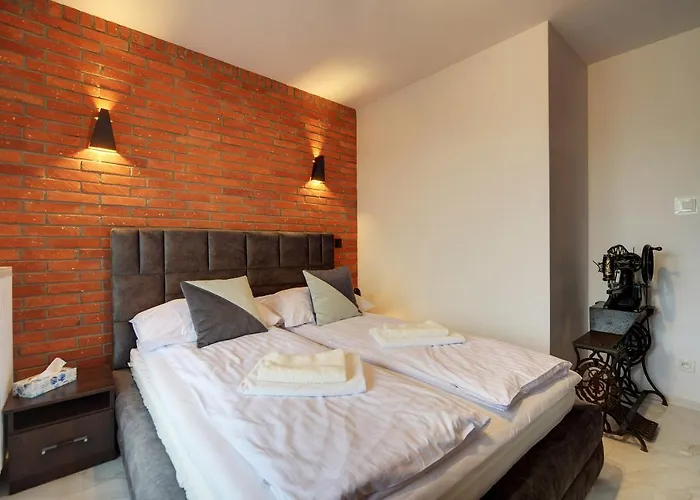 شقة Lodz4rent - Premium 9,7 - Manufaktura - Garaz - Ziemia Obiecana 2026